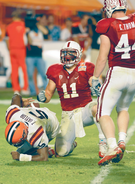 Junior linebacker Shayne Skov (center) is not participating in spring practice since he is still recovering from a knee injury incurred early last season. (SIMON WARBY/The Stanford Daily)