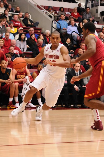 Senior forward Josh Owens (above) scored 6 points and controlled 6 rebounds, but got into early foul trouble as the Stanford men's basketball team lost to Cal at the Staples Center, eliminating the Cardinal from the Pac-12 tournament. (MICHAEL KHEIR/The Stanford Daily)