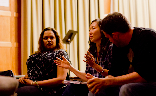 Disability justice activist Mia Mingus, center, speaks on a panel of disability and queer rights activists Monday evening in Roble Theater. The event was part of Transgender Awareness Week, which kicked off Monday afternoon and will continue throughout the week. (ROGER CHEN/The Stanford Daily)