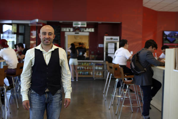 Ike Shehadeh, owner of Ike's Place on Stanford's campus near the Engineering Quad, started from humble beginnings and created one of the largest sandwich empires in the Bay Area. (KEVIN TSUKII/The Stanford Daily)