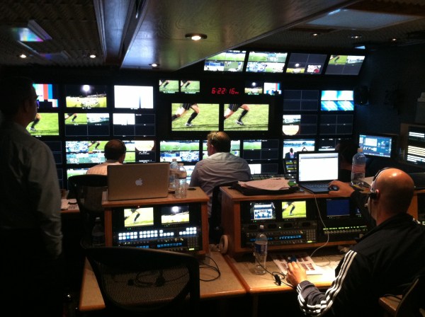 Workers test graphics and camera angles before the Pac-12 Networks' first live event, Stanford's women's soccer home opener against Santa Clara. "We have triple backups," explained Pac-12 Networks Executive Vice President and General Manager Lydia Murphy-Stephens. (JOSEPH BEYDA/The Stanford Daily)