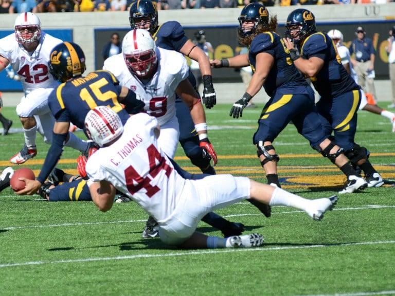 Senior linebacker Chase Thomas (44) and the rest of the Stanford defense had no problem putting pressure on Washington State, but Wazzu nearly pulled off a late comeback before faltering on the final drive of the Cardinal's 24-17 win on Saturday (ROGER CHEN/The Stanford Daily).