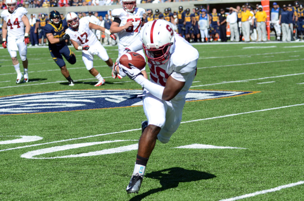 Junior Keanu Nelson (20) and the rest of the Cardinal receiving core hope to replicate last week's performance this weekend against Washington State (ROGER CHEN/The Stanford Daily).