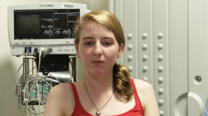 Kristen Powers '16, is in the process of finishing a documentary on her decision to find out if she tested positive for Huntington's disease, the condition which took her mother's life. Here, Powers awaits her test results in her doctor's office. (Courtesy of Kristen Powers)