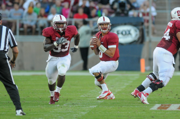 Senior Josh Nunes (center) announced his medical retirement on Monday after a workout-related arm injury this offseason. (SIMON WARBY/The Stanford Daily)