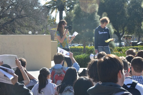 Ma’ayan Dembo ’14 and Miles Unterreiner ’12 M.A. ’13 lead a protest against the University's decision to end student management at Suites Dining. (SEAN CHRISTOFFERSON/The Stanford Daily)