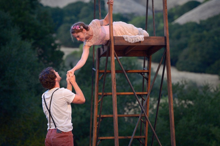 Dan Clegg (Romeo) and Rebekah Brockman (Juliet) in Shana Cooper’s production of Romeo & Juliet; photo by Kevin Berne.