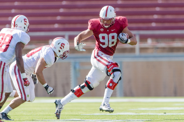 You shouldn't be surprised to see sophomore tight end Luke Kaumatule (right) playing against Cardinal defenders; no tight end on Stanford's roster this season has caught a pass in a college football game. (JIM SHORIN/StanfordPhoto.com)