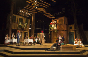 Kate (Gretchen Hall) waits for her husband to be  in Shakespeare Santa Cruz’s 2013 production of "The Taming of the Shrew". Sets by Michael Ganio. Photo courtesy of Shakespeare Santa Cruz.