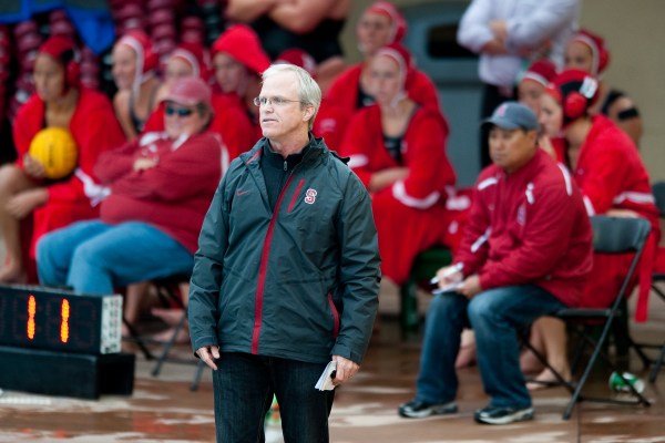 Women's water polo coach John Tanner (front) and men's counterpart John Vargas signed long-term contract extensions, the school announced Thursday. (DON FERIA/StanfordPhoto.com)