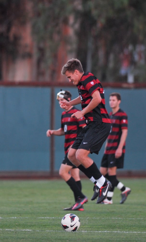 Junior forward Zach Batteer (middle)