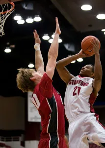 Junior guard-foward Anthony Brown (right) dominated the Thursday night scrimmage, demonstrating a strong and healthy return after his hip injury last season.  