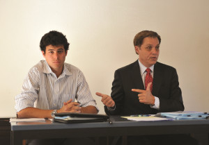 Reid Spitz '14 and Bob Ottilie '77 read statements alleging misconduct at a press conference on Oct. 17.  ZETONG LI/The Stanford Daily