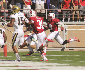 Junior safety Jordan Richards (8) ran one of his two interceptions Saturday back for a touchdown, though part of the return was negated due a penalty on the play. (AVI BAGLA/The Stanford Daily)