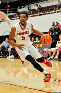 Chasson Randle (5) could not score enough to save Stanford this time as his 33 points were not enough as Stanford lost 112-103. (ZETONG LI/The Stanford Daily)