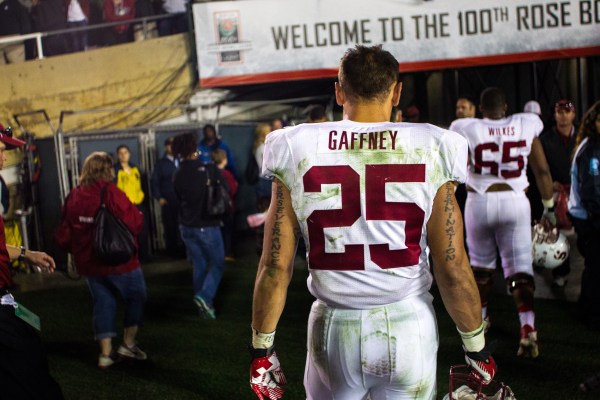 The Cardinal's workhorse running back walks off after Stanford's 24-20 loss. (BEN SULITEANU/The Stanford Daily)