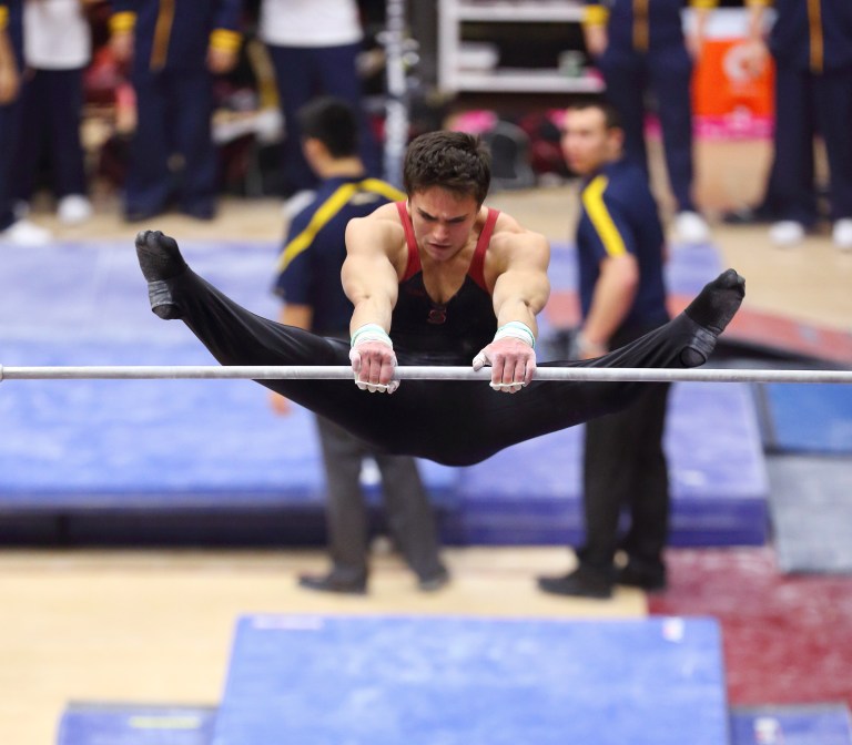 Junior Brian Knott finished first in the parallel bars in the NCAA team finals last year, and headlines a Cardinal team that is looking to replace Nissen-Emery Award winner Eddie Penev. (HECTOR GARCIA-MOLINA/StanfordPhoto.com)