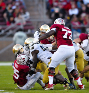 Senior offensive tackle Cameron Fleming (left) rounded out Stanford's 2014 draft class by declaring his intention to enter the NFL Draft on Tuesday. (LUIS AGUILAR/The Stanford Daily)