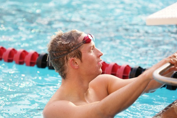 Junior David Nolan (left) was named the Philip Hunsaker Men’s Division I Swimmer of the Week after winning four events in last week's dominant win against Pacific. (LARRY GE/The Stanford Daily)