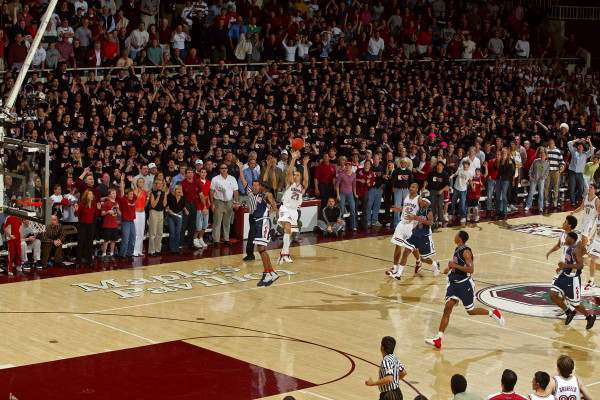 When Nick Robinson ’04 M.A. ’05 sunk a 35-foot runner as time expired to give No. 2 Stanford an 80-77 win against No. 12 Arizona — sending Brent Musburger and Dick Vitale into hysterics, the Sixth Man Club onto the Maples Pavilion hardwood and the Cardinal to a 20-0 record — there were, in truth, no words to describe what had just happened. Ten years to the day after Robinson’s iconic shot, that has changed. (DAVID GONZALES/Stanford Athletics)