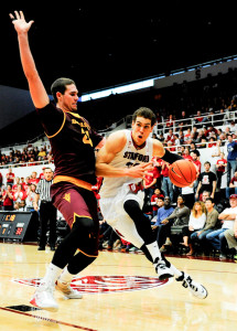 Senior forward Dwight Powell (right)