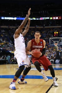 Stanford senior forward Dwight Powell (right) bounced back from an 0-for-9 showing in the Cardinal's first tournament game to lead Stanford in scoring in its 60-57 upset of Kansas. (George Mullinix/KANSAN)