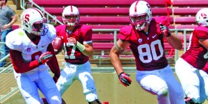 Sophomore tight end Eric Cotton (80) had two receptions for a total of 20 receiving yards at the Cardinal & White Spring Game on Saturday, including a 13-yard touchdown pass from junior Kevin Hogan. Stanford’s tight end corps will look to take a bigger role in the Cardinal’s passing game this coming season. (ZETONG LI/The Stanford Daily)