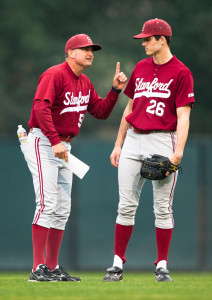 Stanford pitching coach Rusty Filter (left) talks with former Cardinal pitcher and eventual No. 1 overall pick in the 2013 MLB Draft, Mark Appel ’13. In his twenty-plus years of coaching experience, Filter has seen 65 of his pitchers drafted, including four first-rounders. (ZACH SANDERSON/stanfordphoto.com)