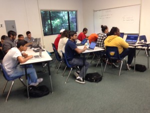 Students work on a programming exercise during CodeCamp’s second session. (ELIA CHEN/The Stanford Daily)