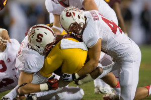 Junior Blake Martinez (left) and fifth-year senior Joe Hemschoot (right) headline the competition at inside linebacker, though sophomore Kevin Palma got most of the first-team reps on Saturday. (DON FERIA/isiphotos.com)