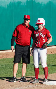 Former Stanford softball head coach John Rittman (left) has been named the associate head coach at the University of Kansas. Rittman notched 16 NCAA tournament berths and seven regional titles during his time on The Farm.