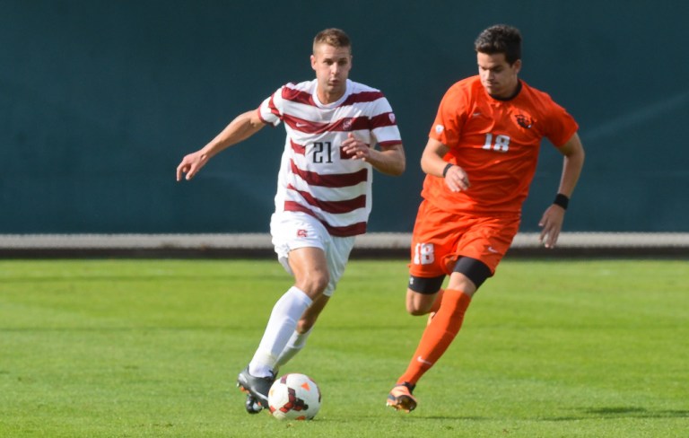 Senior defender Jimmy Callinan (left)