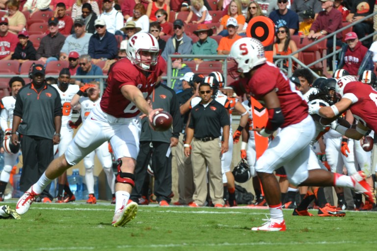 Senior quarterback Kevin Hogan (left)