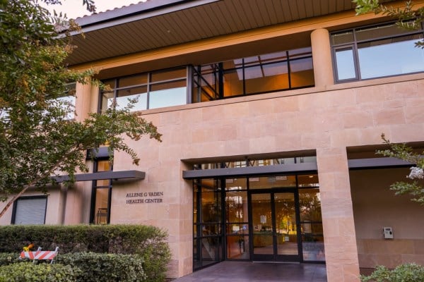 Entrance of Vaden Health Center with sign that says Allene G. Vaden Health Center.