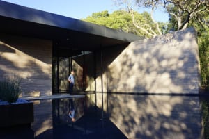 The Windhover Contemplative Center features walls and thick glass windows that block cellular and Internet signals, and the large windows within the interior of the building allow visitors to experience both the indoors and outdoors simultaneously. (KRISTEN STIPANOV/The Stanford Daily)