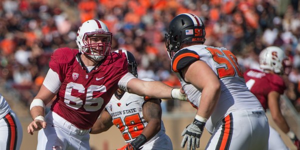 Freshman defensive tackle Harrison Phillips (left) was forced into action at nose when both David Parry and Aziz Shittu went down with injuries. Phillips saw significant time against Arizona State and Oregon and started against Oregon State. (DAVID BERNAL/isiphotos.com)