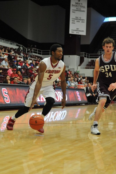 Senior point guard Chasson Randle led the Card in scoring with ___points in the team's 79-76 exhibition win over Cal Poly Pomona. (ZETONG LI/The Stanford Daily)