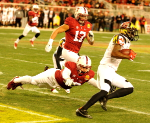 The Stanford defense certainly played a huge part in the victory (as always). Fifth-year senior inside linebacker A.J. Tarpley (above) led the team with 7 tackles in the win, while junior safety Zach Hoffpauir (below) contributed 2 tackles of his own. (MIKE KHEIR/The Stanford Daily)