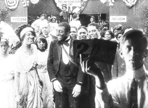 Vaudevillian Bert Williams and cast of "Lime Kiln Walk" demonstrate “The Cake Walk.” Courtesy Museum of Modern Art.