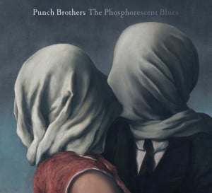 The album artwork features René Magritte's iconic 'The Lovers II.' Courtesy of Nonesuch Publicity. 