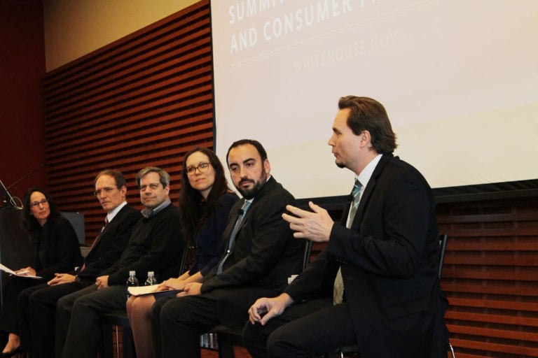 In a panel moderated by Amy Zegart (left), Facebook Chief Information Security Officer Joe Sullivan (right) and four others discussed technical security ideas. (CATALINA RAMIREZ-SAENZ/The Stanford Daily)