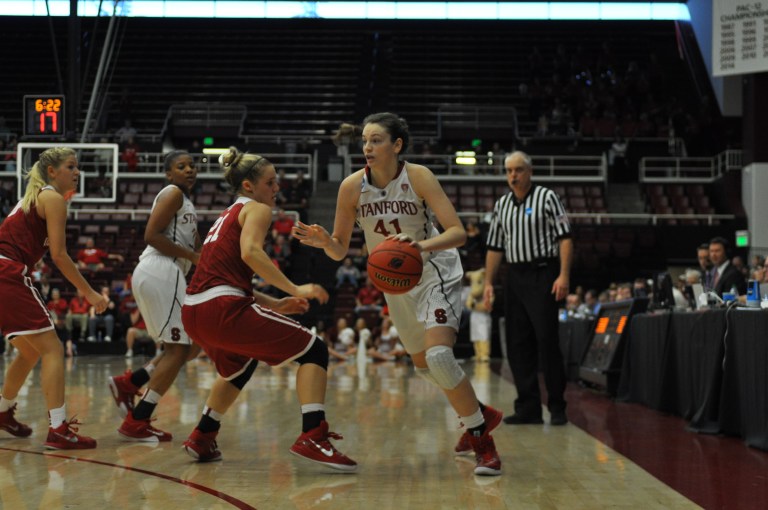 Senior Bonnie Samuelson (right) and the No. 4 Cardinal have one of their toughest challenges of the season ahead of them when they match up with No. 1 Notre Dame in the Sweet 16 of the NCAA Tournament in Oklahoma City on Friday. (RAHIM ULLAH/The Stanford Daily)