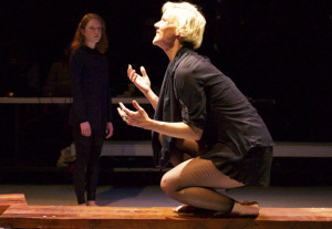 Antigone (r, Madeline H.D. Brown) argues against her sister, Ismene (l, Hannah Donovan). Photo by Chase Ramsey, courtesy of Cutting Ball Theater.