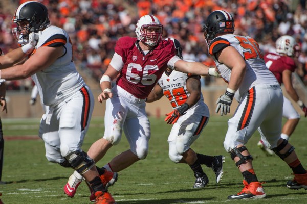 Harrison Phillips (center) made six appearances last season and started at nose tackle for the Cardinal on Saturday, defending one pass before departing the game due to injury. That injury was later confirmed to be a torn ACL. (DAVID BERNAL/isiphotos.com)