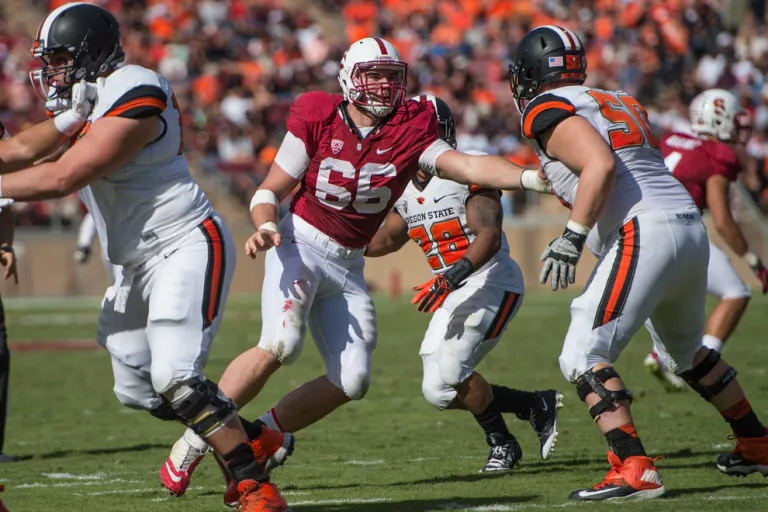 Harrison Phillips (center) made six appearances last season and started at nose tackle for the Cardinal on Saturday, defending one pass before departing the game due to injury. That injury was later confirmed to be a torn ACL. (DAVID BERNAL/isiphotos.com)