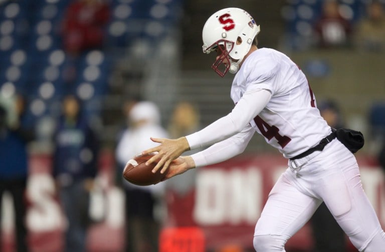 Ben Rhyne (above) excelled both on the field and in the classroom during his career on the Farm. He graduated with a 3.88 GPA and has high hopes that he will get drafted into the NFL this weekend. (STEPHEN BRASHEAR/stanfordphoto.com)