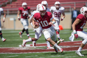 Sophomore quarterback Keller Chryst (center) is competing for the backup job with Burns but wasn't too effective as a quarterback, as he finished just 1-for-8 on Saturday. (FRANK CHEN/The Stanford Daily)