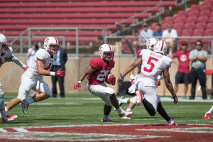 Senior running back Barry Sanders (center) 