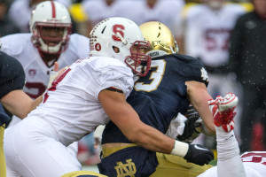 Senior linebacker Blake Martinez (left) notched 102 tackles last season, a team high. (ROBIN ALAM/isiphotos.com)