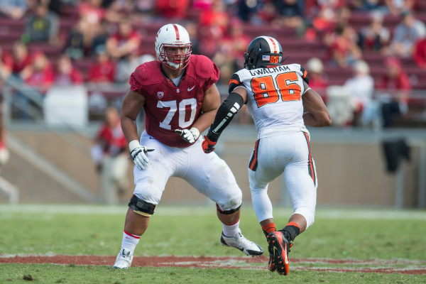 By being selected with the 13th overall pick by the New Orleans Saints, Andrus Peat '16 (left) was the Cardinal's first top-20 selection in the NFL Draft since Andrew Luck. Even with Peat anchoring the left side of the line, though, the Tunnel Workers' Union suffered from arguably one of its worst seasons in the Harbaugh-Shaw era. (DAVID BERNAL/isiphotos.com)